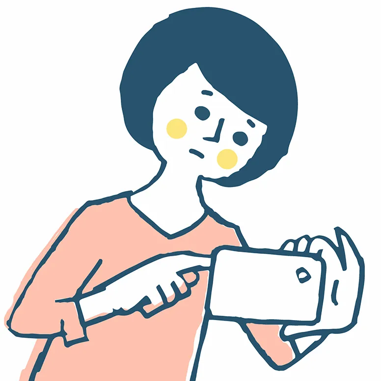 スマホで写真を撮る女性